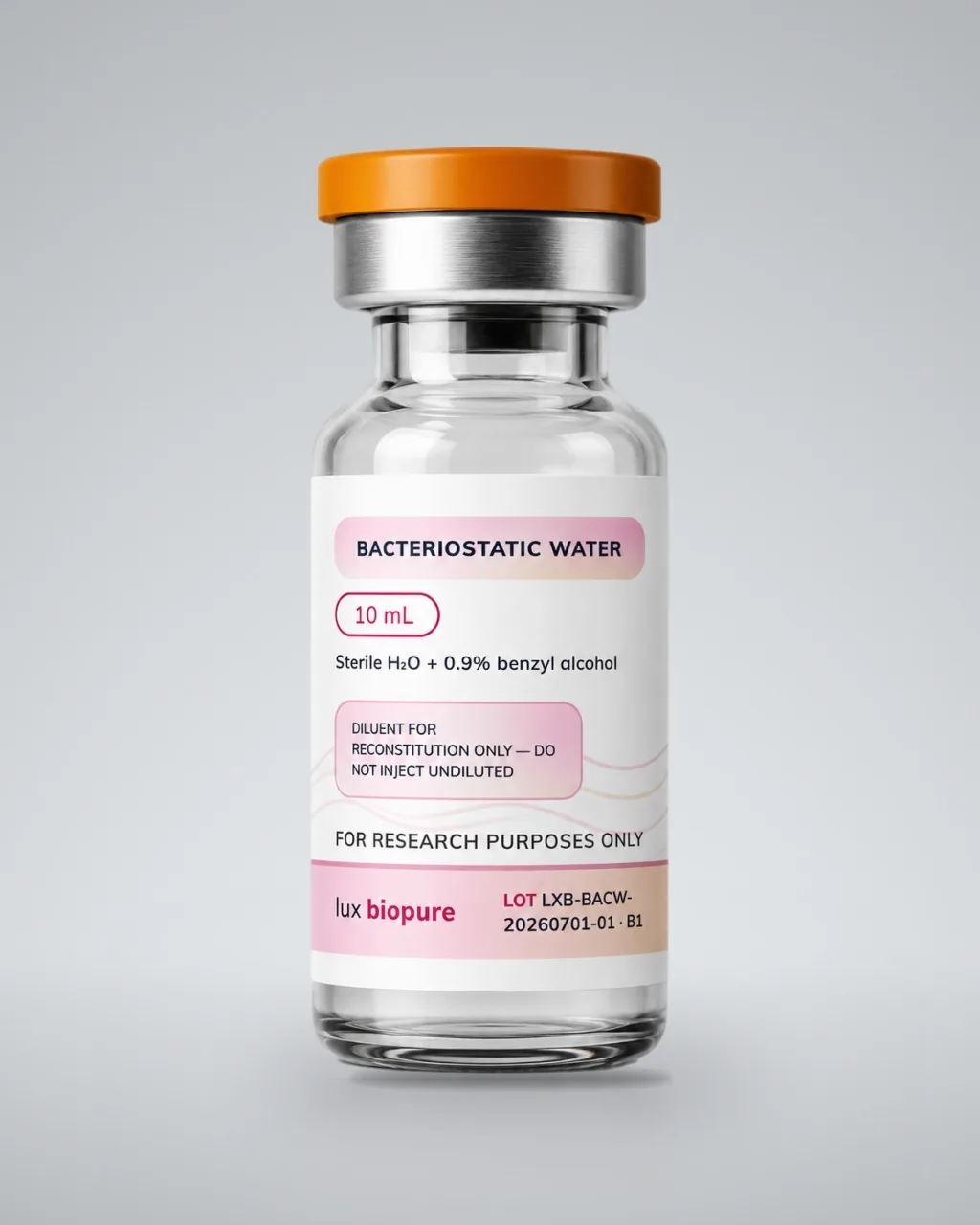 Bacteriostatic water vial standing upright on a plain pale grey ground, label facing forward
